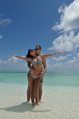 Image showing happy young couple have fun on beach