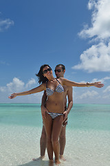 Image showing happy young couple have fun on beach