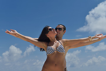 Image showing happy young couple have fun on beach