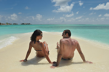 Image showing happy young couple have fun on beach