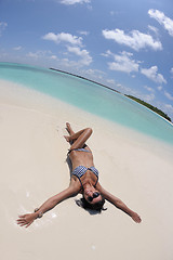 Image showing beautiful young woman  on beach have fun and relax