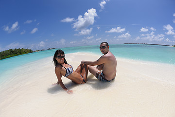 Image showing happy young couple have fun on beach