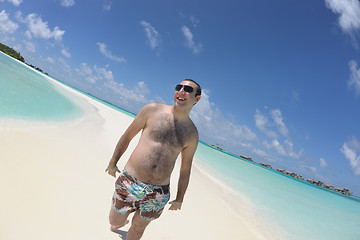 Image showing young man have fun and relax on beach