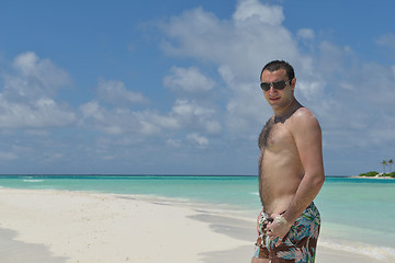 Image showing young man have fun and relax on beach