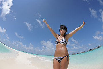 Image showing beautiful young woman  on beach have fun and relax