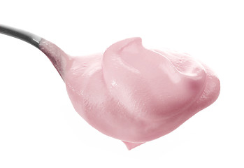 Image showing Spoon with pink cream