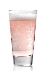 Image showing Glass of pink cider