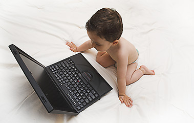 Image showing baby and laptop