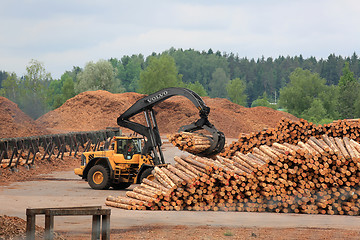 Image showing Volvo L180F HL Log Loader Working at Lumber Yard