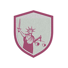 Image showing Metallic Statue of Liberty Holding Sword Scales Justice Shield