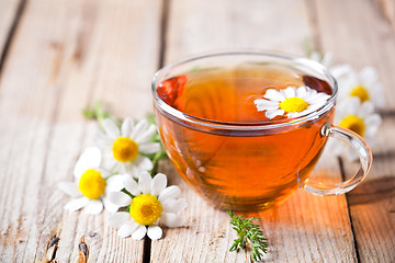 Image showing cup of tea with chamomile flowers 