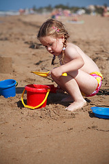 Image showing Kid playing with sand