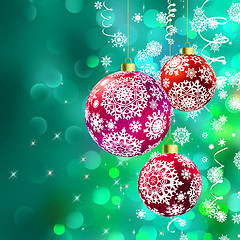 Image showing Christmas balls over green bokeh. EPS 8