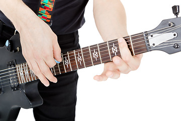 Image showing Man on a white background. Performer with an electric guitar