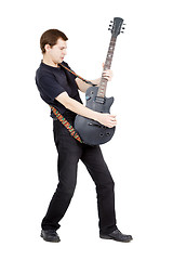 Image showing Man on a white background. Performer with an electric guitar