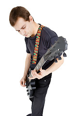 Image showing Man on a white background. Performer with an electric guitar