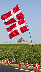 Image showing Mont Saint Michel Monastery and Danish Flags