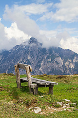 Image showing Wooden bench and in the background the Austrian Alps