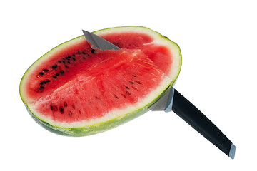 Image showing Fresh watermelon with kitchen knife isolated over white background