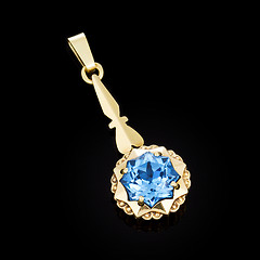 Image showing Gold pendant with blue stone