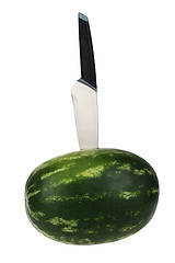 Image showing Fresh watermelon with kitchen knife isolated over white background