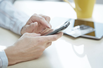 Image showing Hands of smartphone user