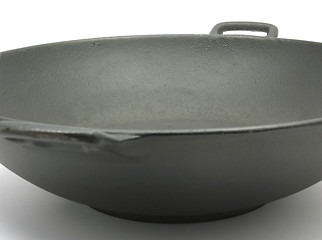 Image showing A big black wok for cooking on white