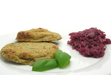 Image showing Round flat potato dough cakes with basil and red cabbage