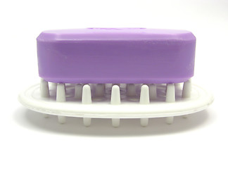 Image showing Lilac soap on a soap dish on a white background