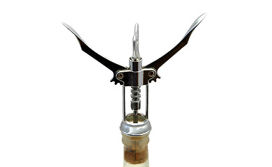Image showing White wine and corkscrew