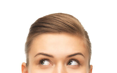 Image showing close up of beautiful female eyes looking up