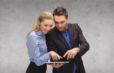 Image showing businesswoman and businessman with tablet pc