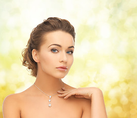 Image showing woman wearing shiny diamond pendant