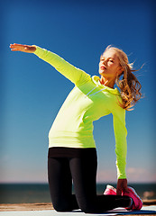 Image showing woman doing sports outdoors