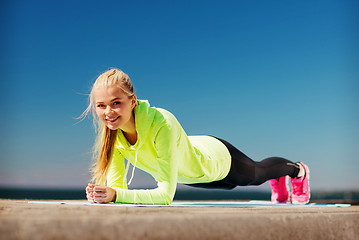 Image showing woman doing sports outdoors