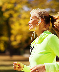 Image showing woman doing running outdoors