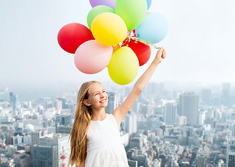 Image showing happy girl with colorful balloons