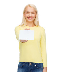 Image showing smiling girl with blank business or name card