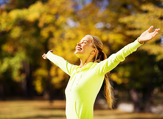 Image showing woman doing sports outdoors