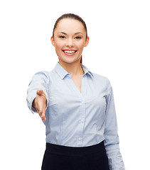 Image showing businesswoman with opened hand ready for handshake