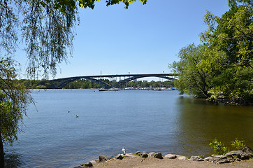 Image showing One of the many bridges in the green city of Stockholm - capital