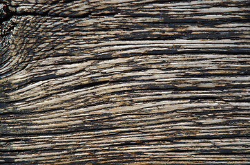 Image showing Weathered tarred wooden background