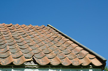 Image showing Broken tiled roof