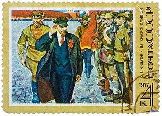 Image showing Stamp printed in the USSR shows Lenin on Red Square by K. Filato