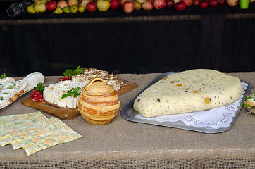 Image showing homemade organic curd cheese with poppy on table 