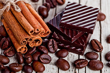 Image showing chocolate sweets, cinnamon and coffee beans 