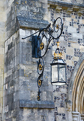 Image showing Ornate lantern on a stone wall 