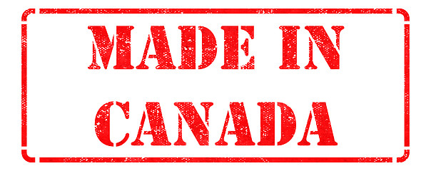 Image showing Made in Canada - inscription on Red Rubber Stamp.