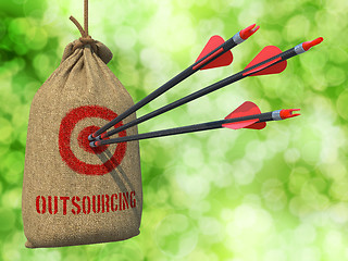 Image showing Outsourcing - Arrows Hit in Red Mark Target.