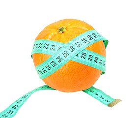 Image showing Measure tape on orange tangerine